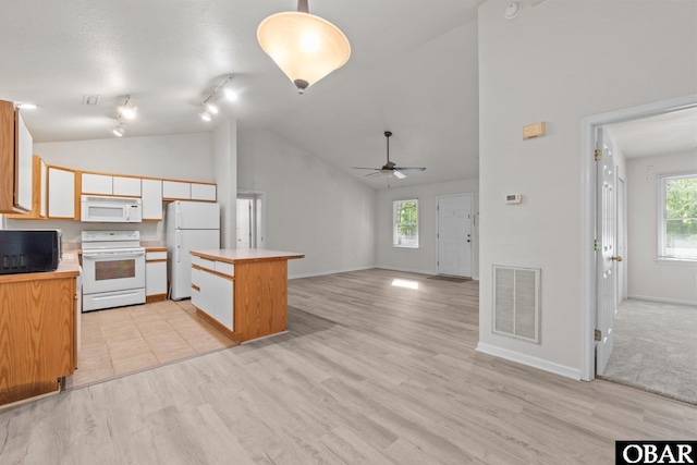 106 Mybet Ct Lot 97, Kill Devil Hills, NC 27948 - kitchen featuring white appliances, plenty of natural light, a ceiling fan, a center island, and high vaulted ceiling