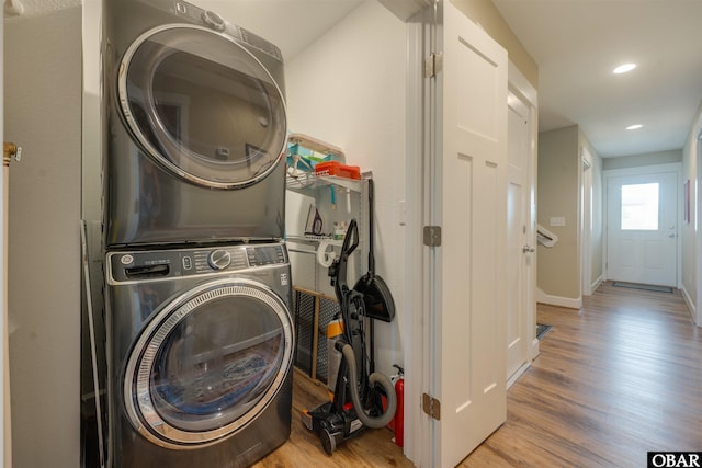 27197 Black Dog Ln Lot 9, Salvo, NC 27972 - laundry area featuring stacked washer / drying machine, wood finished floors, and recessed lighting