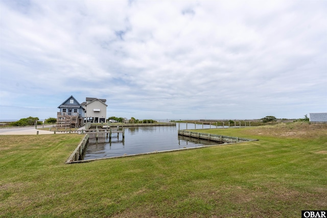 27197 Black Dog Ln Lot 9, Salvo, NC 27972 - dock with a water view and a yard
