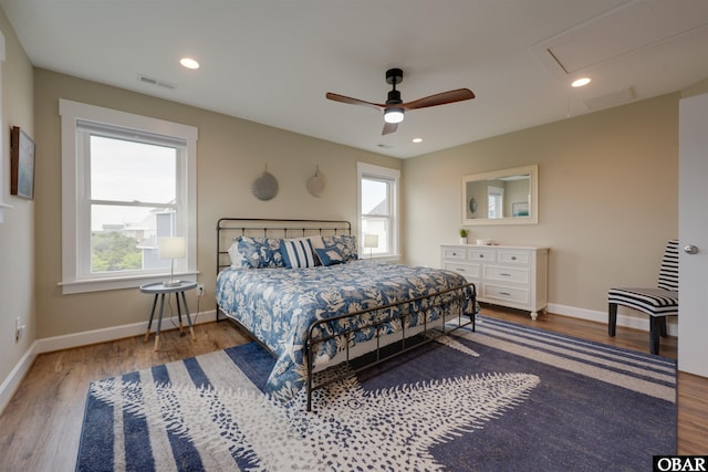 27197 Black Dog Ln Lot 9, Salvo, NC 27972 - bedroom featuring wood finished floors, attic access, ceiling fan, and recessed lighting