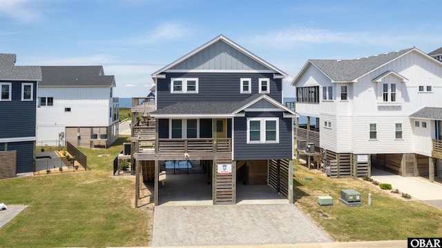 27197 Black Dog Ln Lot 9, Salvo, NC 27972 - coastal home with a carport, decorative driveway, and stairway