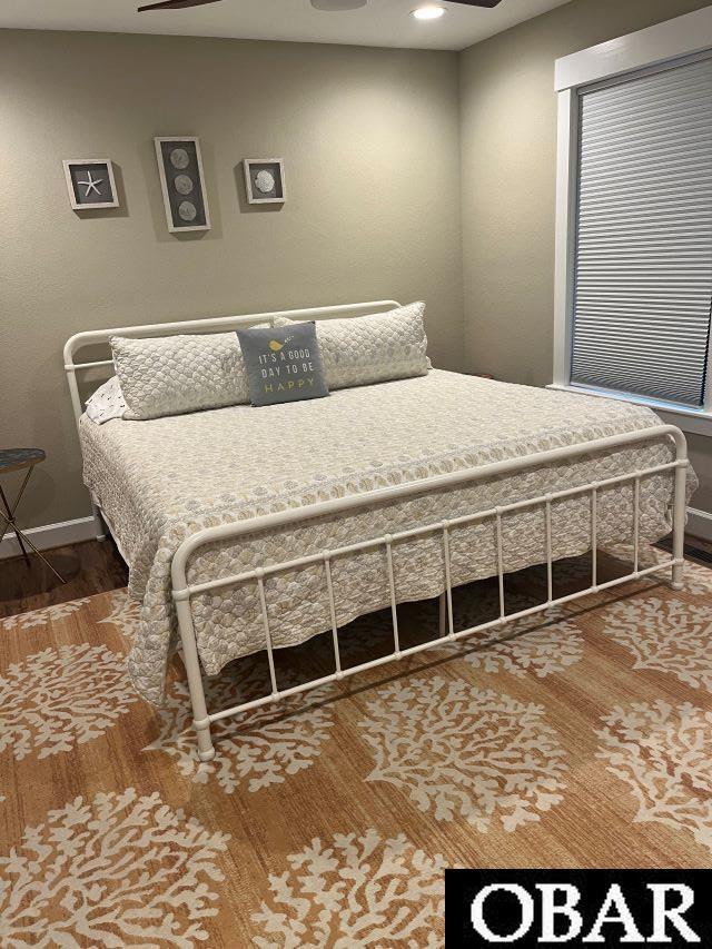 27197 Black Dog Ln Lot 9, Salvo, NC 27972 - bedroom with wood finished floors, ceiling fan, and recessed lighting