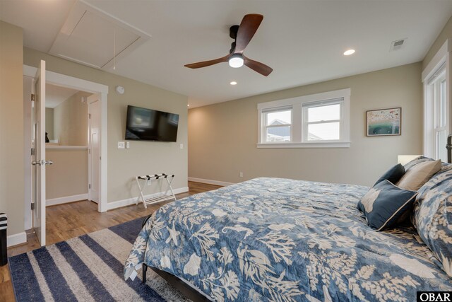 27197 Black Dog Ln Lot 9, Salvo, NC 27972 - bedroom with attic access, wood finished floors, a ceiling fan, and recessed lighting