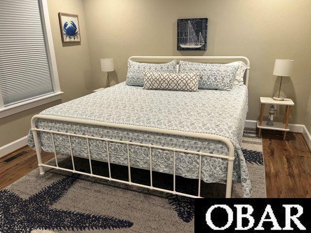 27197 Black Dog Ln Lot 9, Salvo, NC 27972 - bedroom featuring wood finished floors