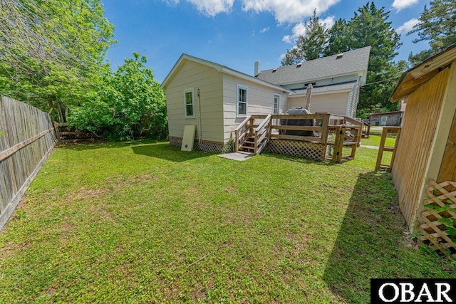 807 S St Lot 11, Manteo, NC 27954 - rear view of house featuring a lawn, a fenced backyard, and a deck