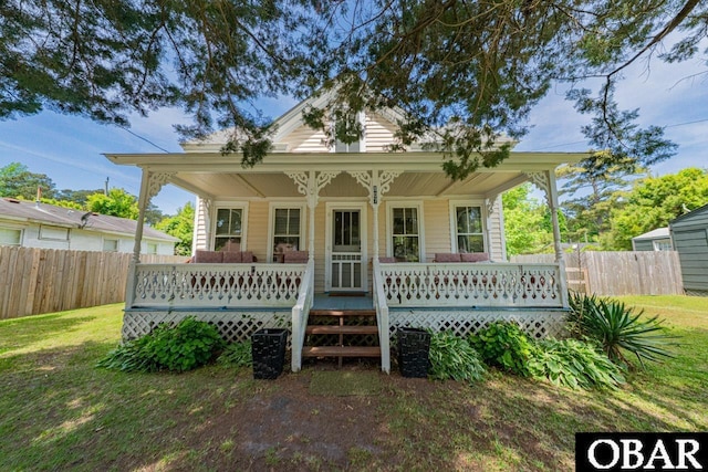 807 S St Lot 11, Manteo, NC 27954 - rear view of house featuring a yard, fence, and covered porch