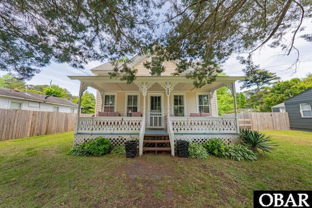 807 S St Lot 11, Manteo, NC 27954 - rear view of property with a lawn, fence, and a porch