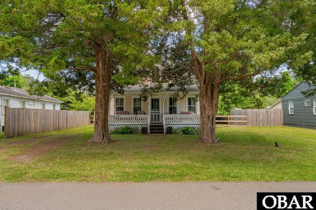 807 S St Lot 11, Manteo, NC 27954 - bungalow-style house featuring a front lawn, fence, and covered porch