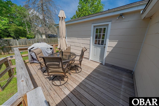 807 S St Lot 11, Manteo, NC 27954 - wooden deck with fence and outdoor dining space