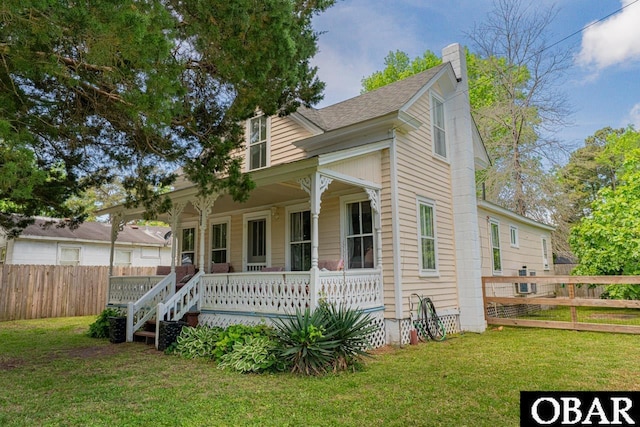 807 S St Lot 11, Manteo, NC 27954 - bungalow with fence, covered porch, a chimney, and a front yard