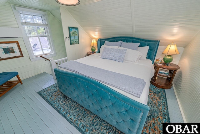 807 S St Lot 11, Manteo, NC 27954 - bedroom featuring wood-type flooring, wood walls, and lofted ceiling