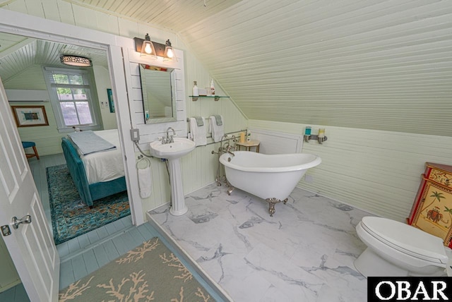 807 S St Lot 11, Manteo, NC 27954 - bathroom with marble finish floor, toilet, wood ceiling, a freestanding bath, and vaulted ceiling