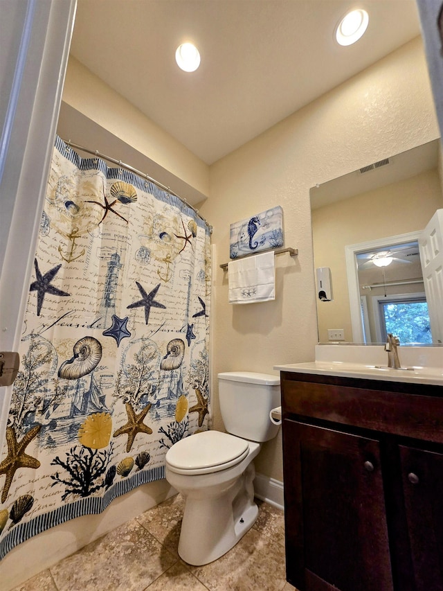 1111 Cambridge Rd Unit 308B, Kill Devil Hills, NC 27948 - full bathroom with toilet, vanity, tile patterned flooring, and a shower with shower curtain