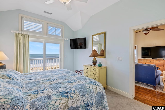 bedroom with visible vents, baseboards, lofted ceiling, access to outside, and carpet floors