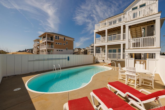 view of pool featuring a fenced in pool, a patio area, and a fenced backyard