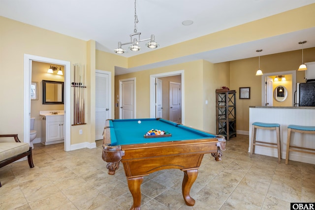 rec room featuring pool table, a sink, and baseboards