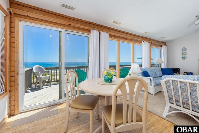 8415 S Old Oregon Inlet Rd Lot, Lot, Nags Head, NC 27959 - sunroom / solarium with a water view and wood finished floors