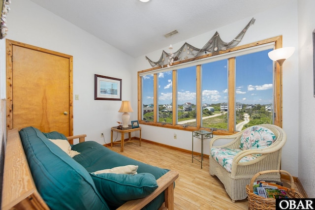 8415 S Old Oregon Inlet Rd Lot, Lot, Nags Head, NC 27959 - sitting room featuring lofted ceiling, wood finished floors, and baseboards