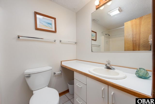 8415 S Old Oregon Inlet Rd Lot, Lot, Nags Head, NC 27959 - bathroom with tile patterned flooring, toilet, vanity, a textured ceiling, and a shower