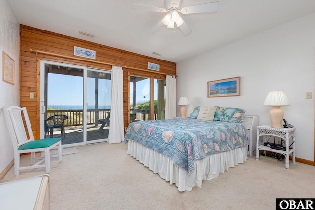 8415 S Old Oregon Inlet Rd Lot, Lot, Nags Head, NC 27959 - carpeted bedroom featuring access to outside, wooden walls, a ceiling fan, and baseboards