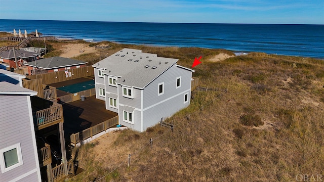 aerial view featuring a beach view and a water view