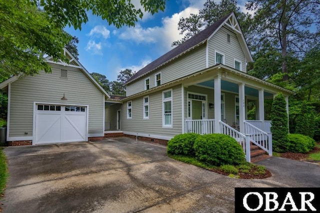 102 William And Mary Way Lot 13, Manteo, NC 27954 - view of front of house with a porch, a garage, and driveway