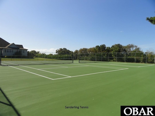 view of sport court featuring community basketball court and fence