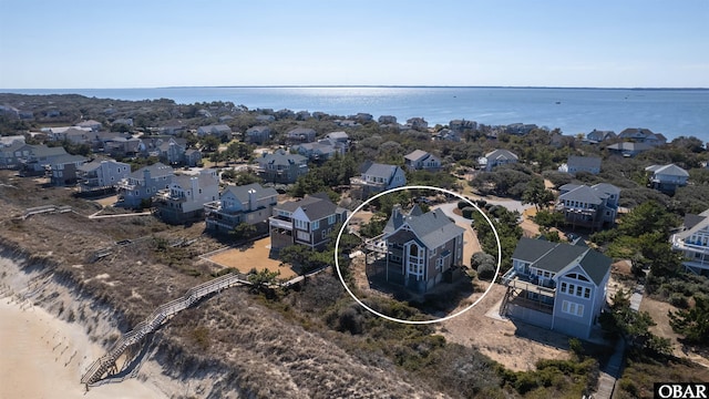 aerial view featuring a water view and a residential view