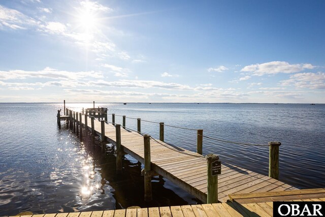 dock area featuring a water view