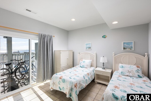 bedroom featuring access to outside, visible vents, recessed lighting, and light tile patterned floors