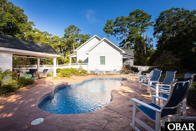 view of pool with a patio area, a fenced backyard, and a fenced in pool