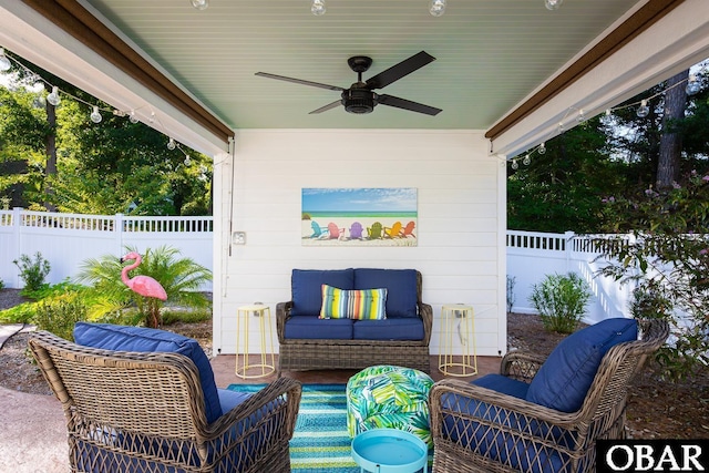 view of patio featuring outdoor lounge area, a fenced backyard, and a ceiling fan