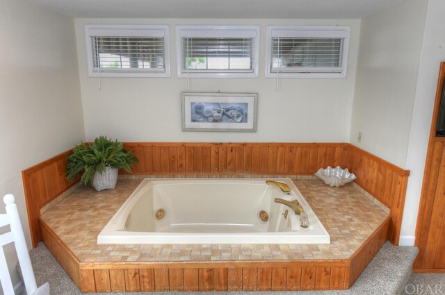 bathroom with a jetted tub