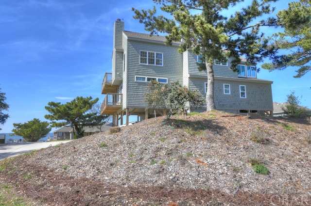 rear view of house with a chimney