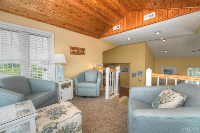 living room featuring lofted ceiling, wooden ceiling, visible vents, and carpet flooring