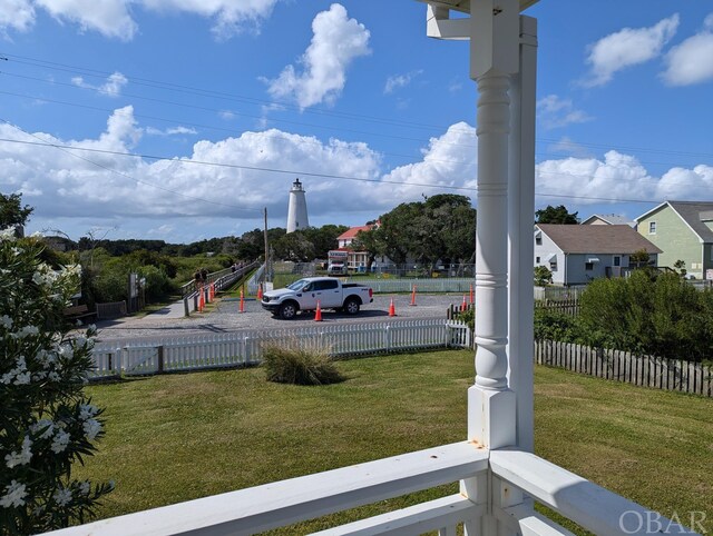369 Lighthouse Rd Lot # 2, Ocracoke, NC 27960 - view of yard with fence and a residential view