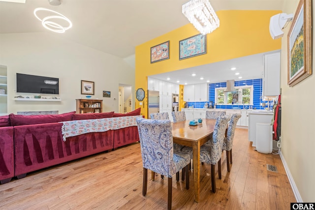 41 Eagles Nest Ln Lot 372, Southern Shores, NC 27949 - dining room featuring high vaulted ceiling and light wood-style flooring