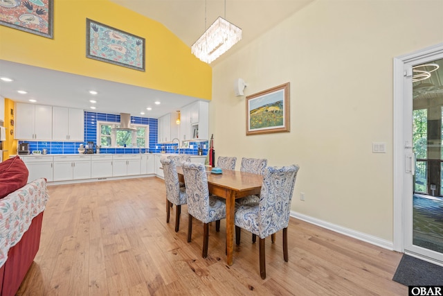 41 Eagles Nest Ln Lot 372, Southern Shores, NC 27949 - dining room with light wood-style flooring, healthy amount of natural light, baseboards, high vaulted ceiling, and recessed lighting
