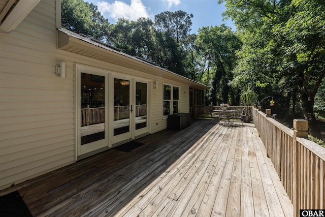 41 Eagles Nest Ln Lot 372, Southern Shores, NC 27949 - deck featuring french doors, outdoor dining area, and view of wooded area