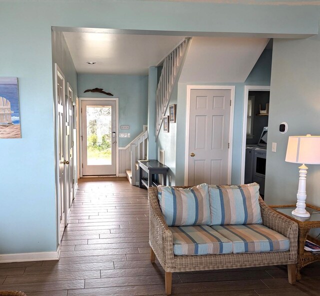 415 British Cemetery Rd Lot # 1 & 2, Ocracoke, NC 27960 - living area with dark wood-type flooring, separate washer and dryer, stairway, and baseboards