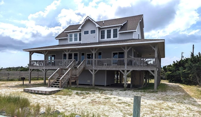415 British Cemetery Rd Lot # 1 & 2, Ocracoke, NC 27960 - view of front of property with a shingled roof and stairs