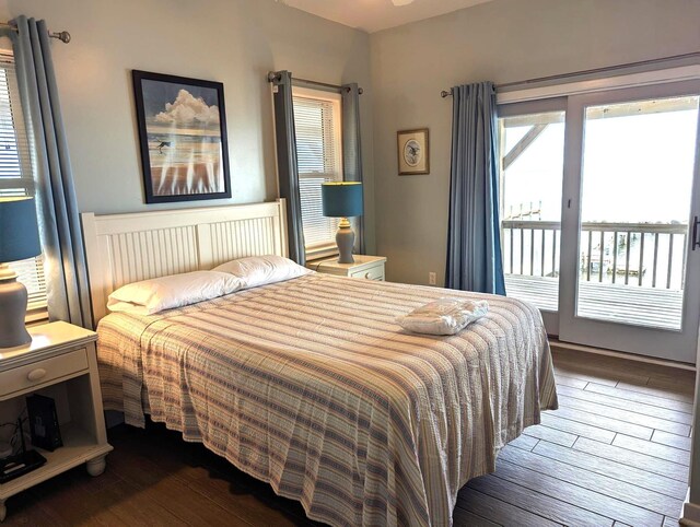 415 British Cemetery Rd Lot # 1 & 2, Ocracoke, NC 27960 - bedroom with access to exterior and hardwood / wood-style flooring