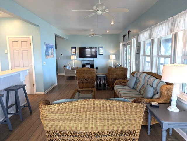 415 British Cemetery Rd Lot # 1 & 2, Ocracoke, NC 27960 - living area with dark wood-style floors, a ceiling fan, and baseboards