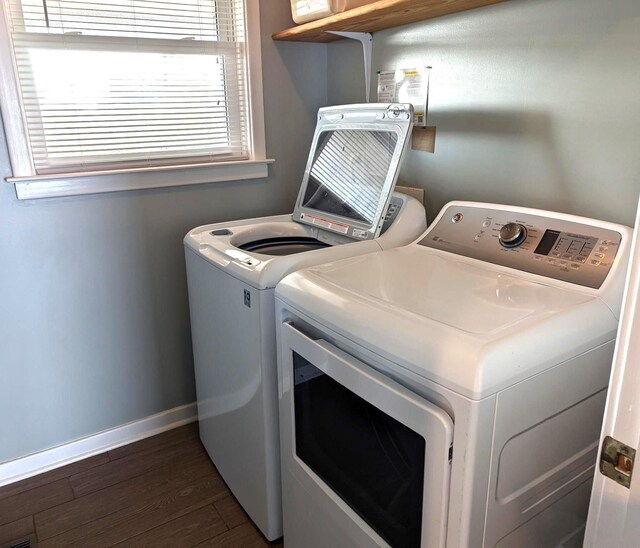 415 British Cemetery Rd Lot # 1 & 2, Ocracoke, NC 27960 - laundry area with independent washer and dryer, dark wood-style flooring, and baseboards