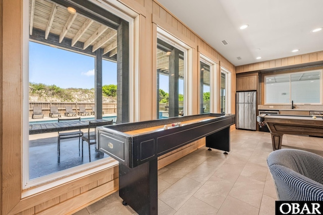 981 Lighthouse Dr Lot 10, Corolla, NC 27927 - recreation room featuring wooden walls, light tile patterned floors, and recessed lighting