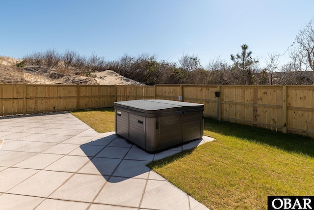 981 Lighthouse Dr Lot 10, Corolla, NC 27927 - fenced backyard featuring a hot tub and a patio area
