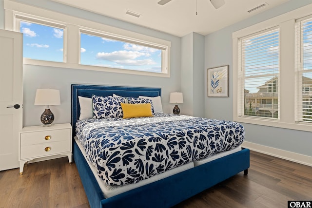 981 Lighthouse Dr Lot 10, Corolla, NC 27927 - bedroom featuring wood finished floors, multiple windows, and ceiling fan