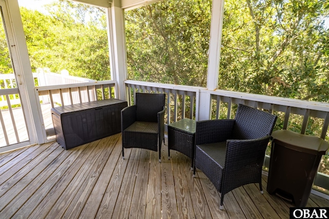 wooden deck featuring outdoor lounge area