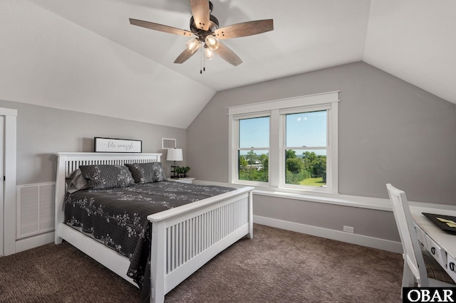 carpeted bedroom featuring visible vents, vaulted ceiling, baseboards, and ceiling fan