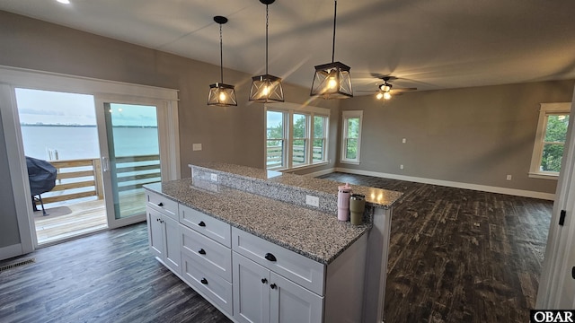 105 Baggy Davis Ln Lot 20B, Currituck, NC 27929 - kitchen featuring dark wood-type flooring, ceiling fan, open floor plan, and white cabinets